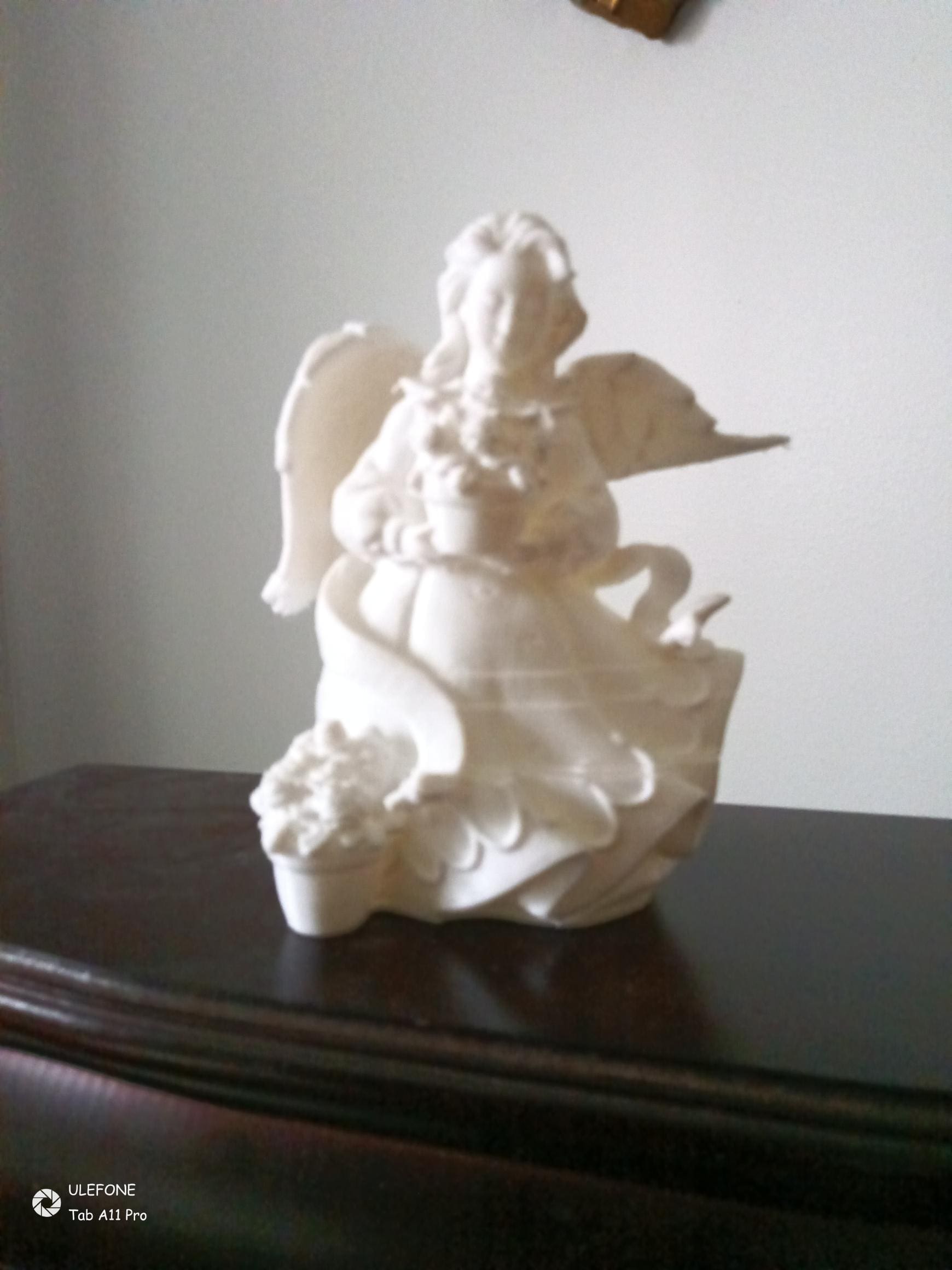 Angel statuette with flowers 1 Angel statuette with flowers 02