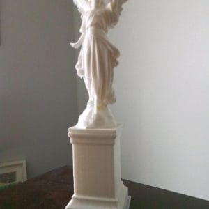 Angel looking at the sky figurine statuette